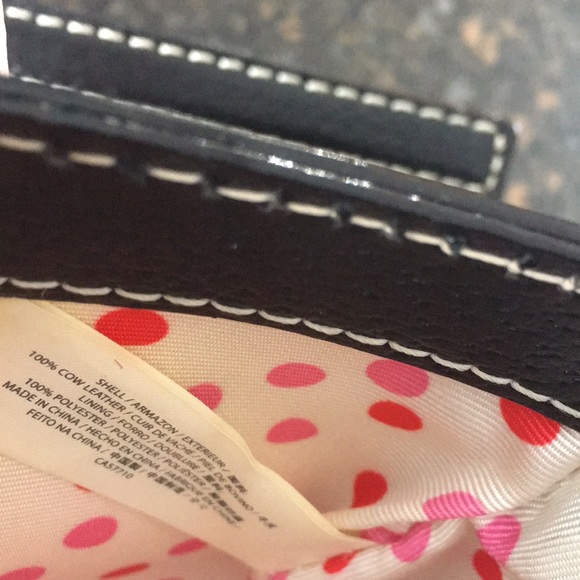 Lovely, Mint condition black leather Kate Spade crossbody purse. - Picture 9 of 10